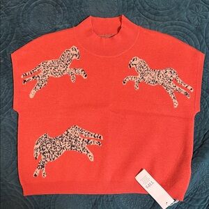 Orange Sweater with Leopard Print Horses